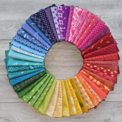 Rainbow color wheel of colorful cotton prints.